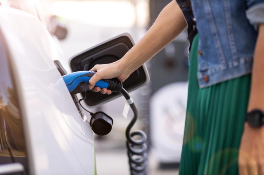 Women Charging Car